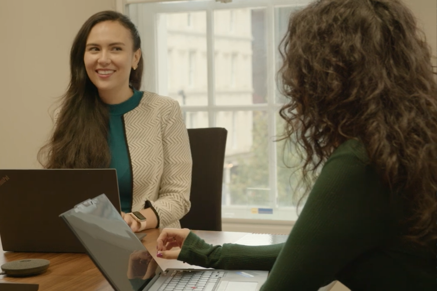 Orbian Team Members in Conversation